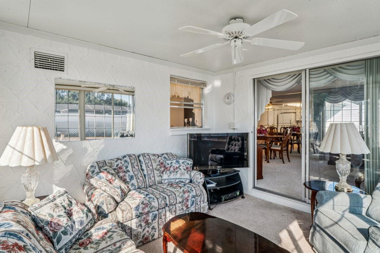 Sunroom and kitchen pass through view