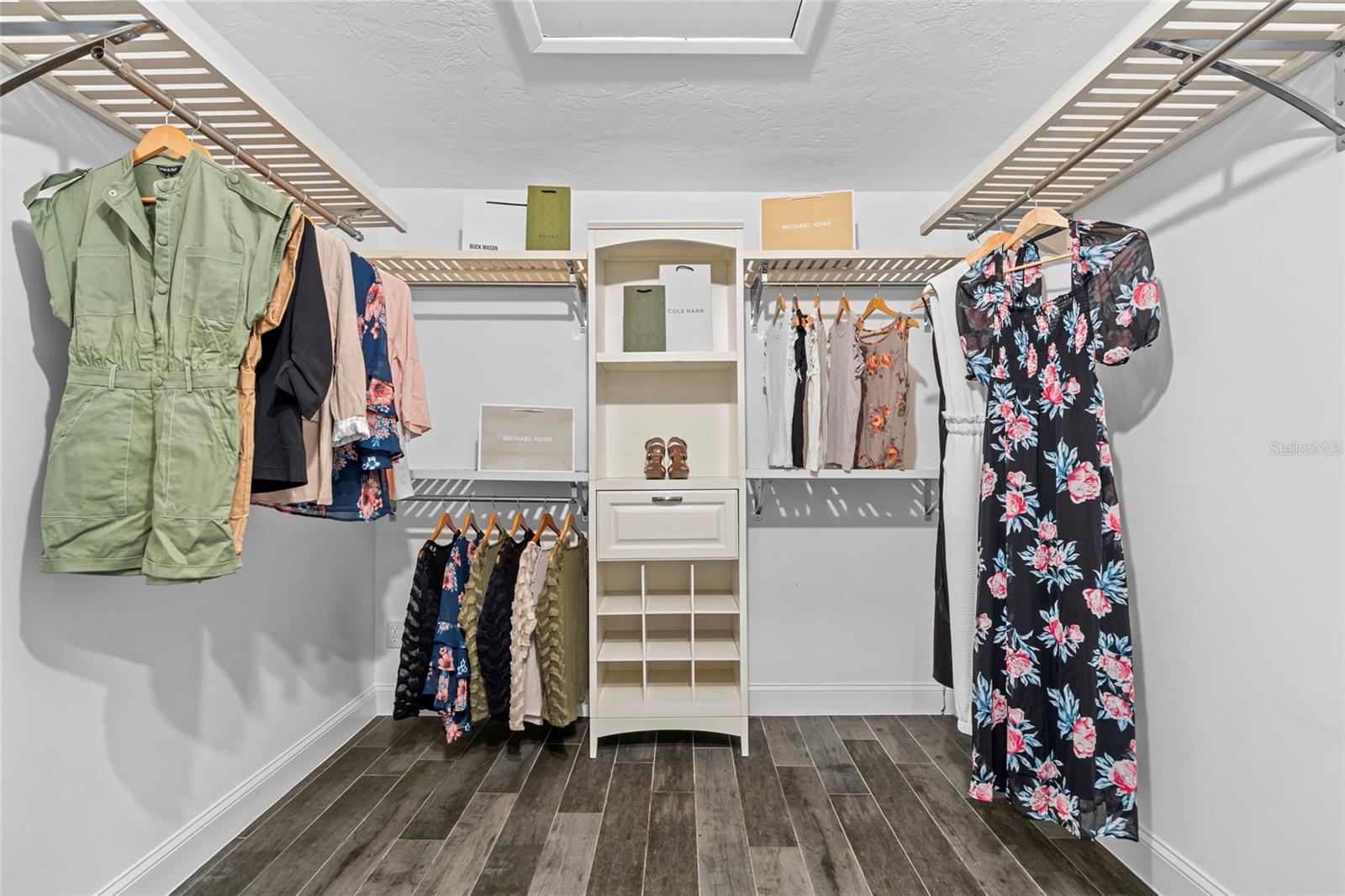 Primary bedroom walk-in closet