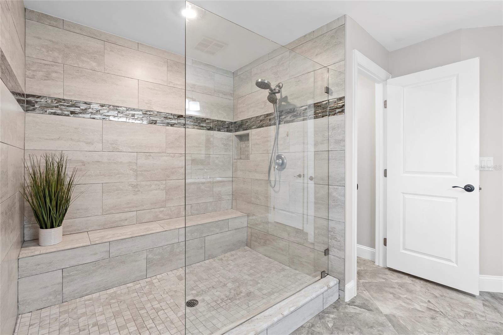 Primary bedroom with walk-in shower