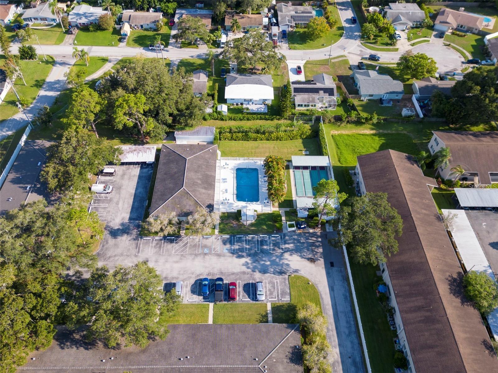 Club house, pool and shuffleboard courts