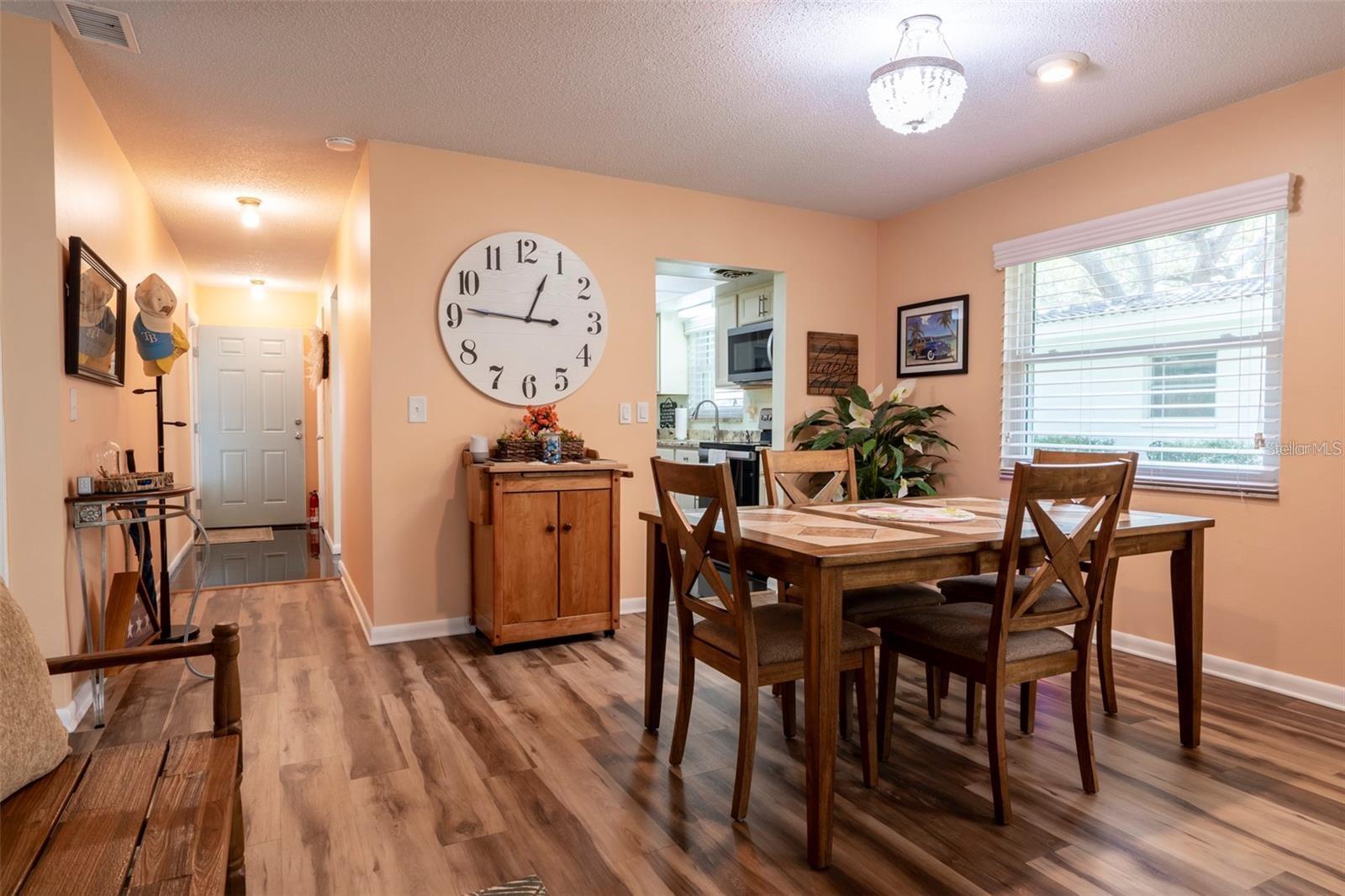 Dining room open to the living room and the bonus room