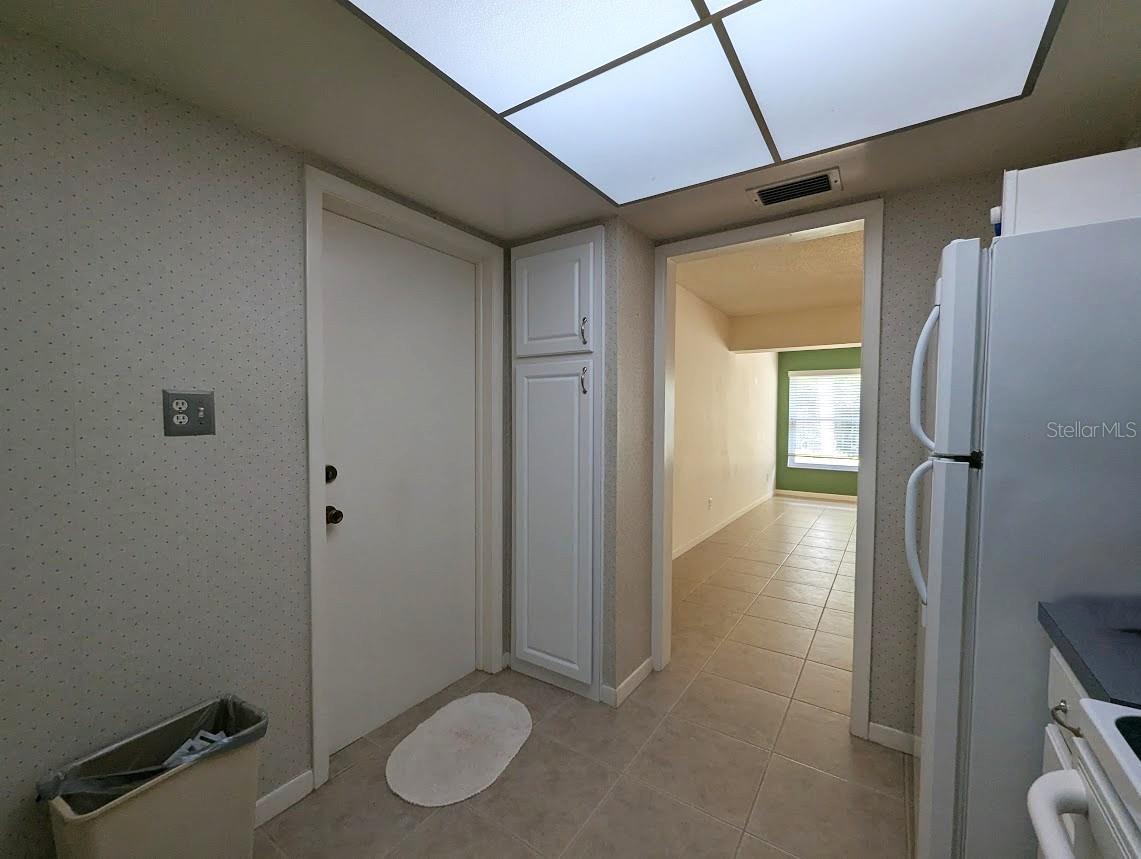 Kitchen with door to garage