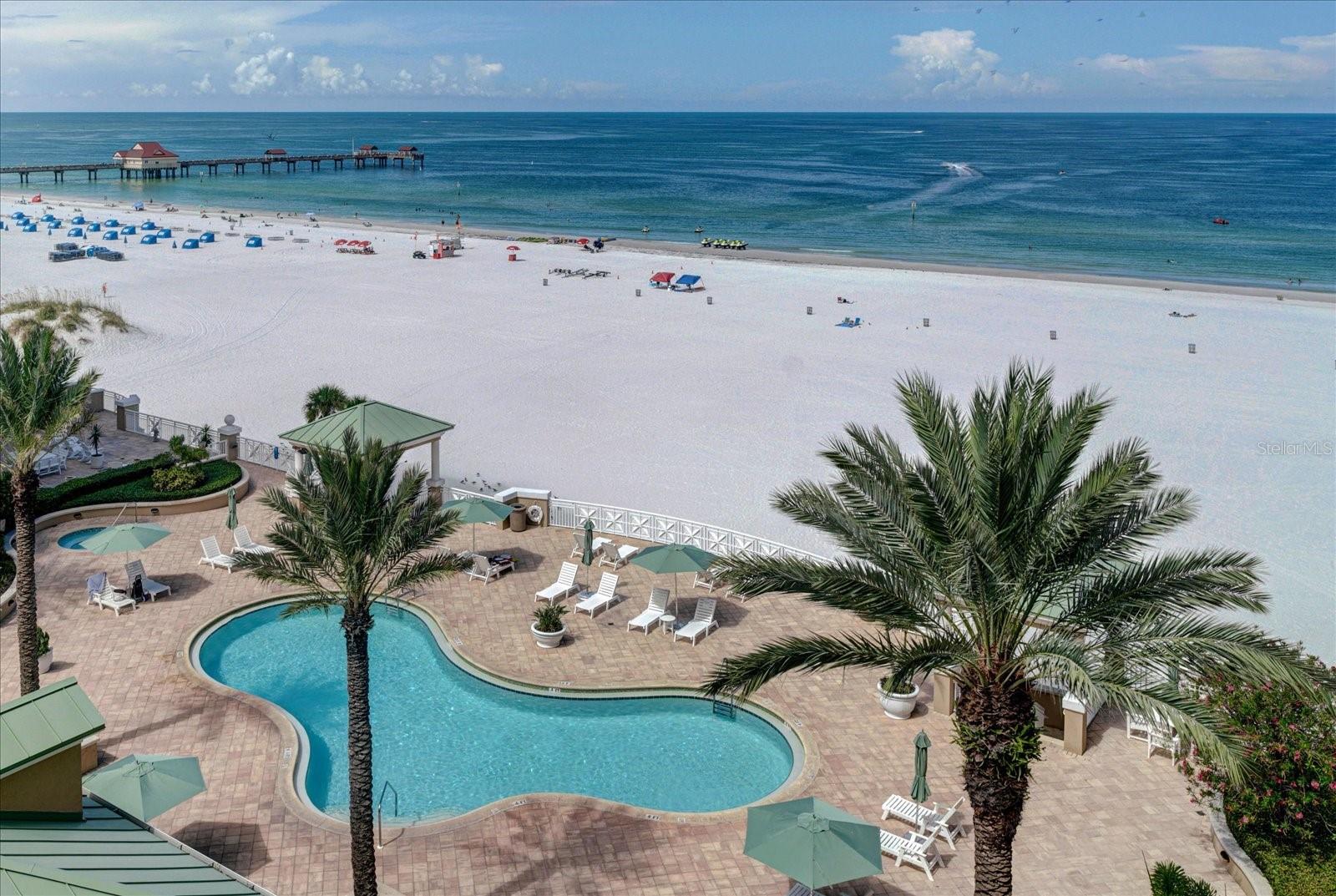 POOL AREA OVERLOOKS GULF AND BEACH