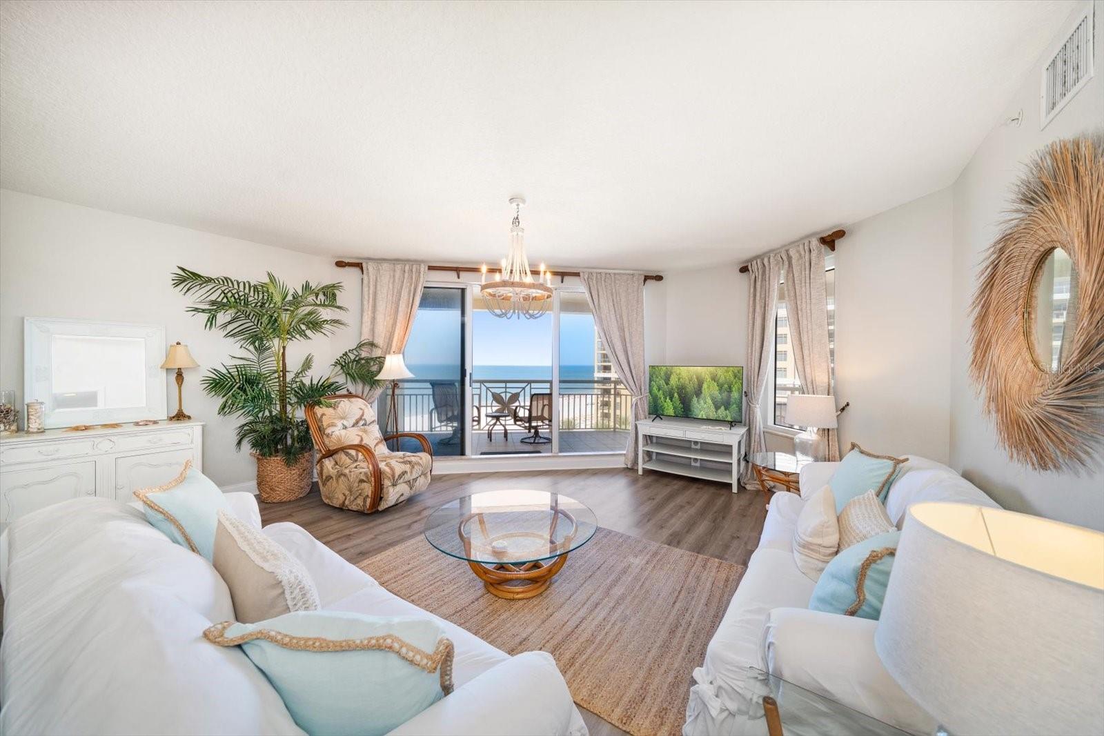 LIVING ROOM W/ NEE LUXURY VINYL FLOORING