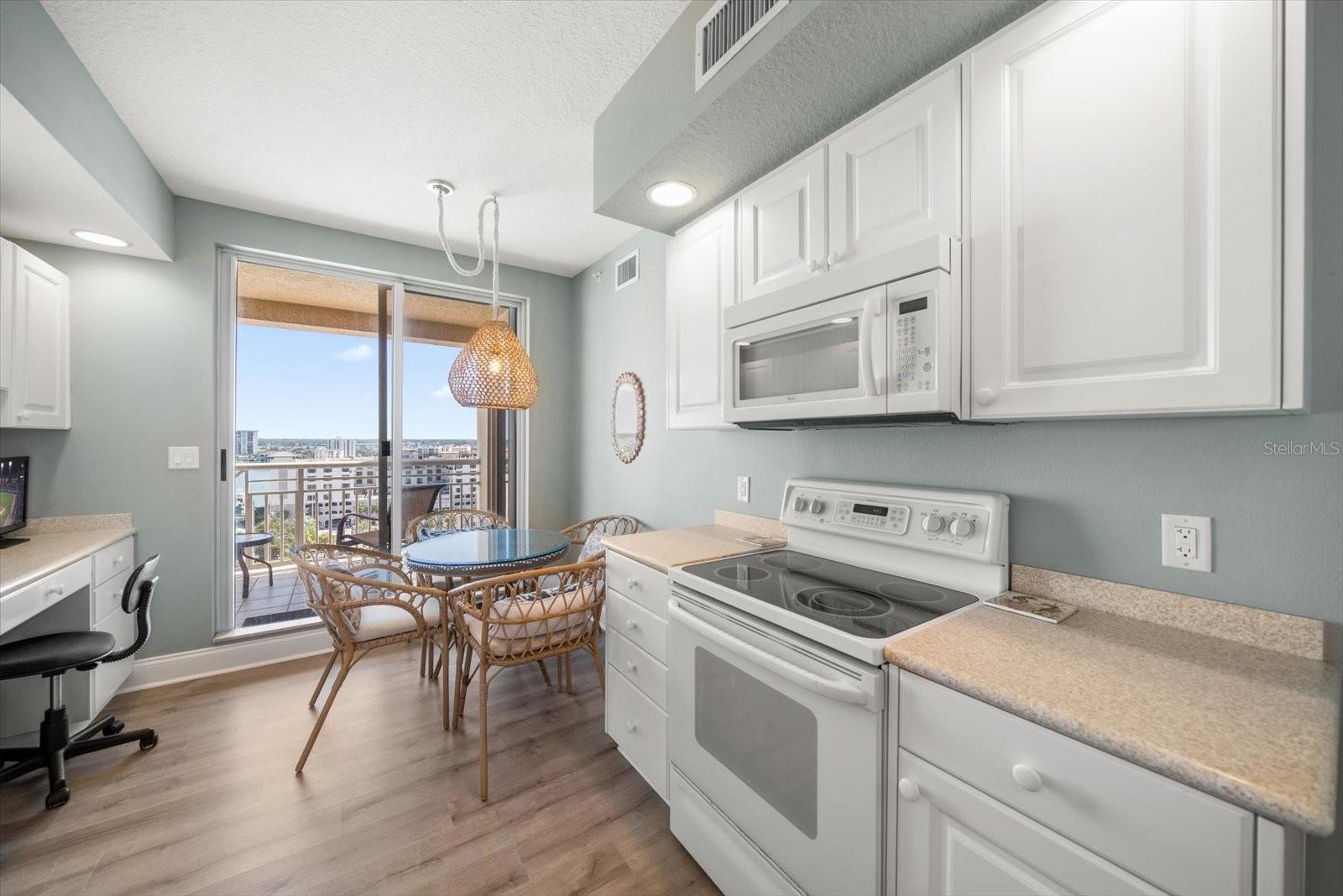 BREAKFAST AREA ABD DESK IN KITCHEN - LEADS TO BALCONY 2