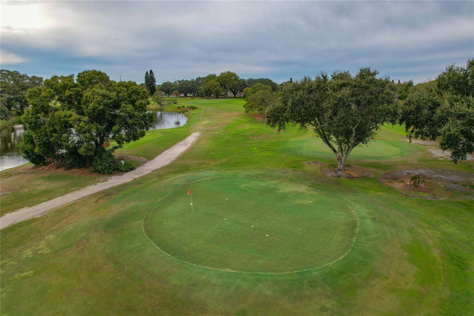 GOLF COMMUNITY! THREE 9 HOLE COURSES!