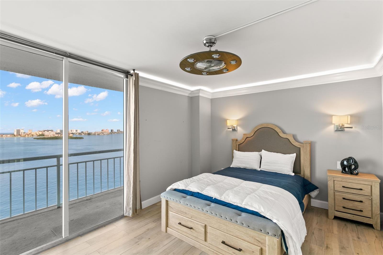 Second bedroom with sliders to balcony