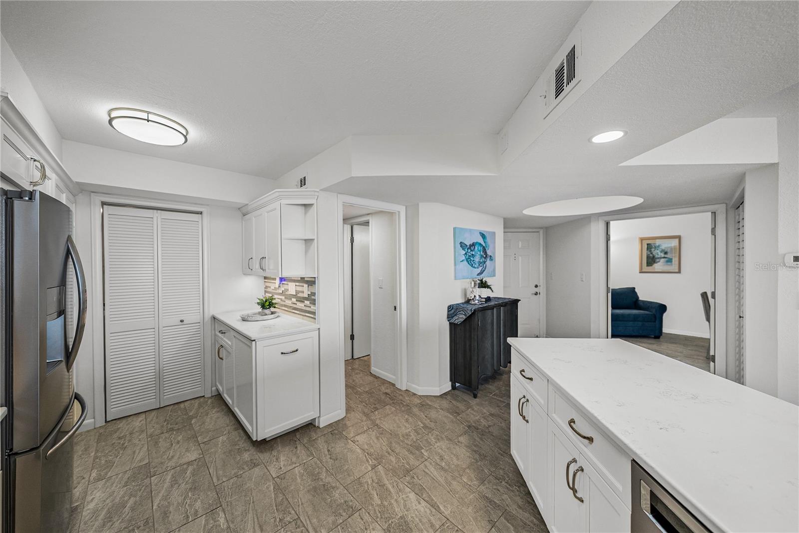 View from Kitchen to laundry room, en-suite bedroom suite and study