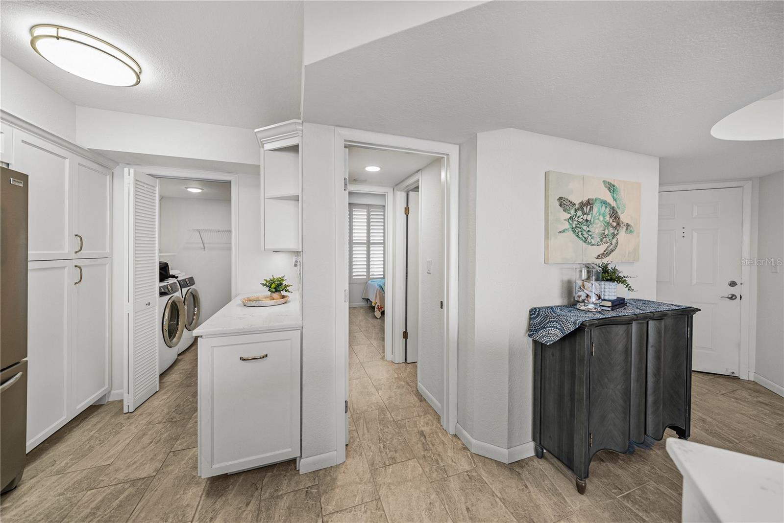 View from Kitchen to Laundry Room and Guest En-suite