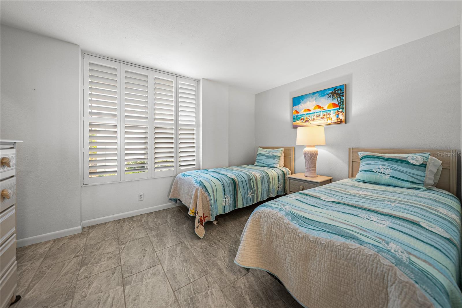 Guest Bedroom looking out to the front exterior