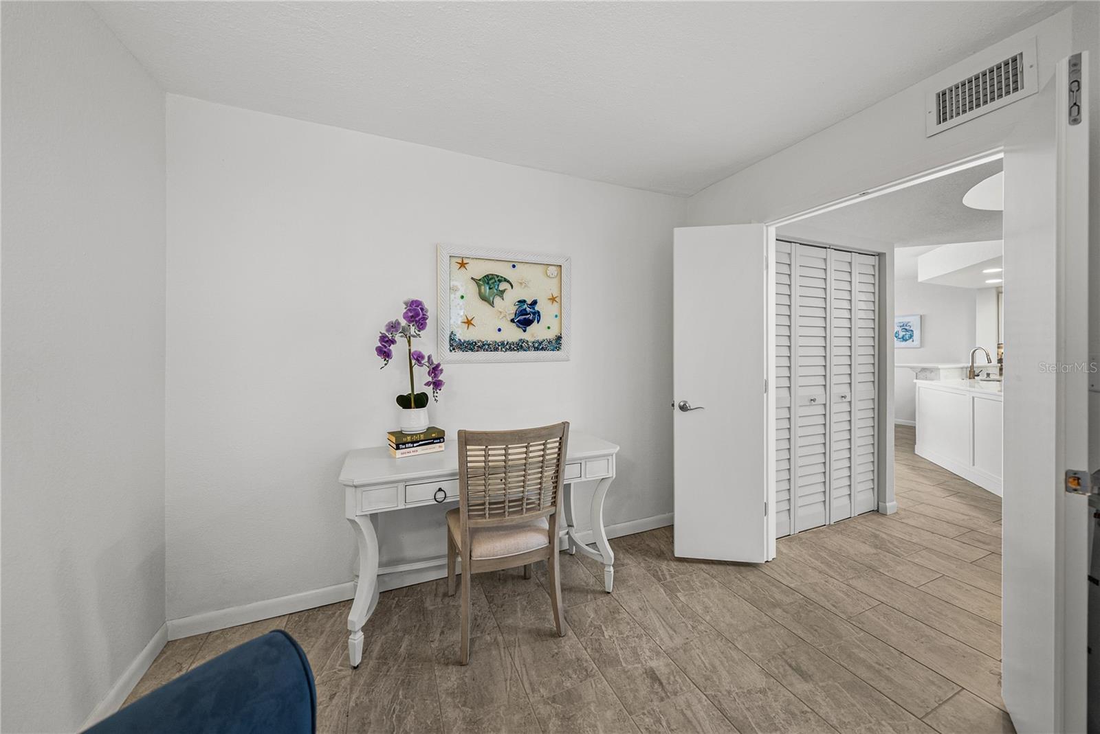 View from Study to Front Entry and Kitchen