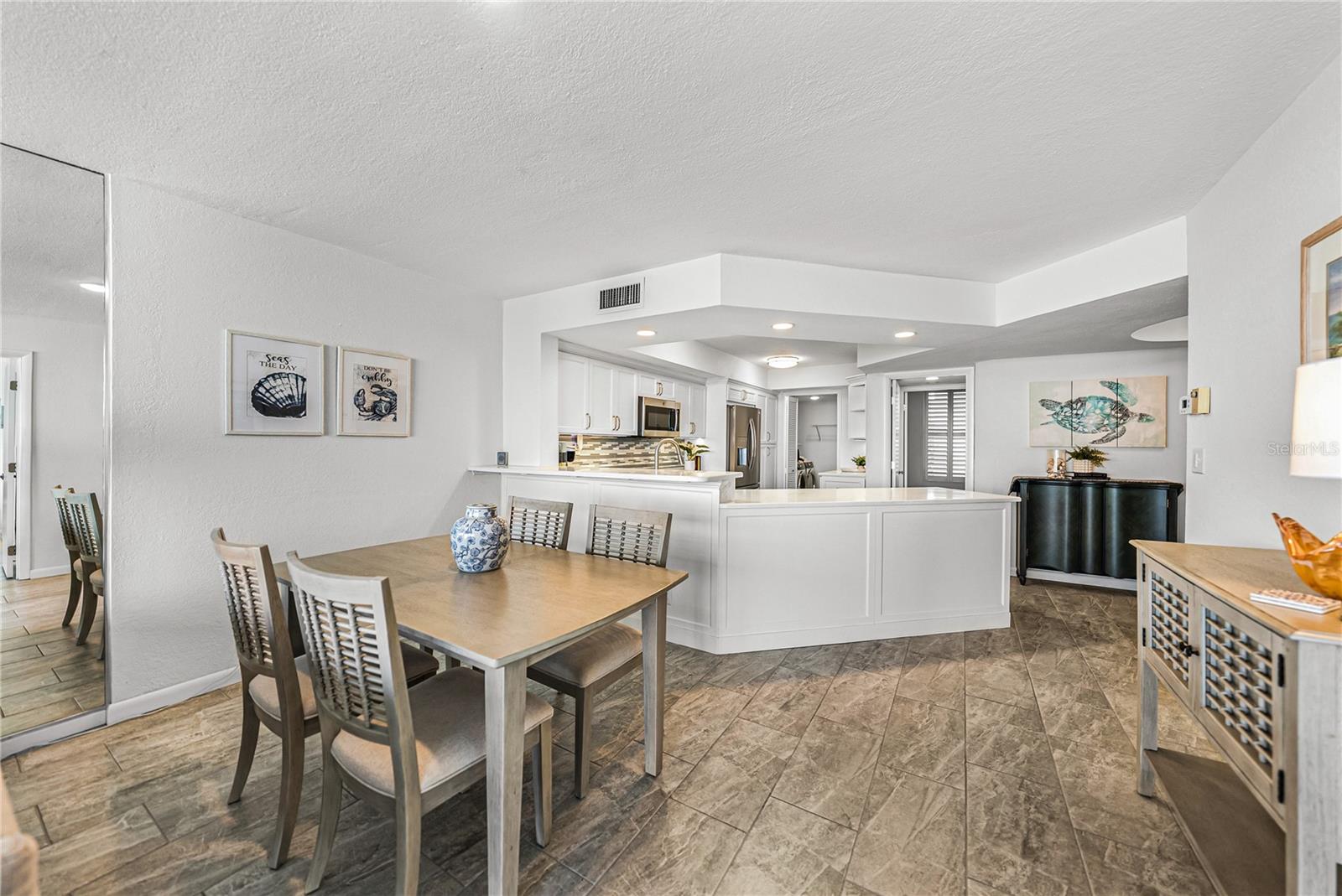 Dining area and Kitchen looking back toward Guest En-suite and laundry