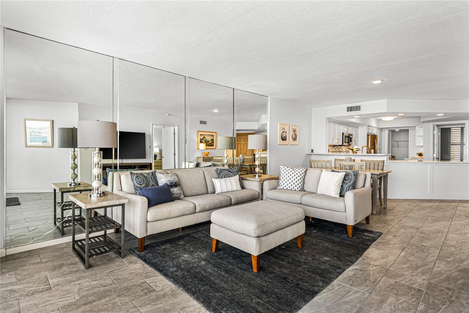 Living Room, Dining area and Kitchen view from Deck slider