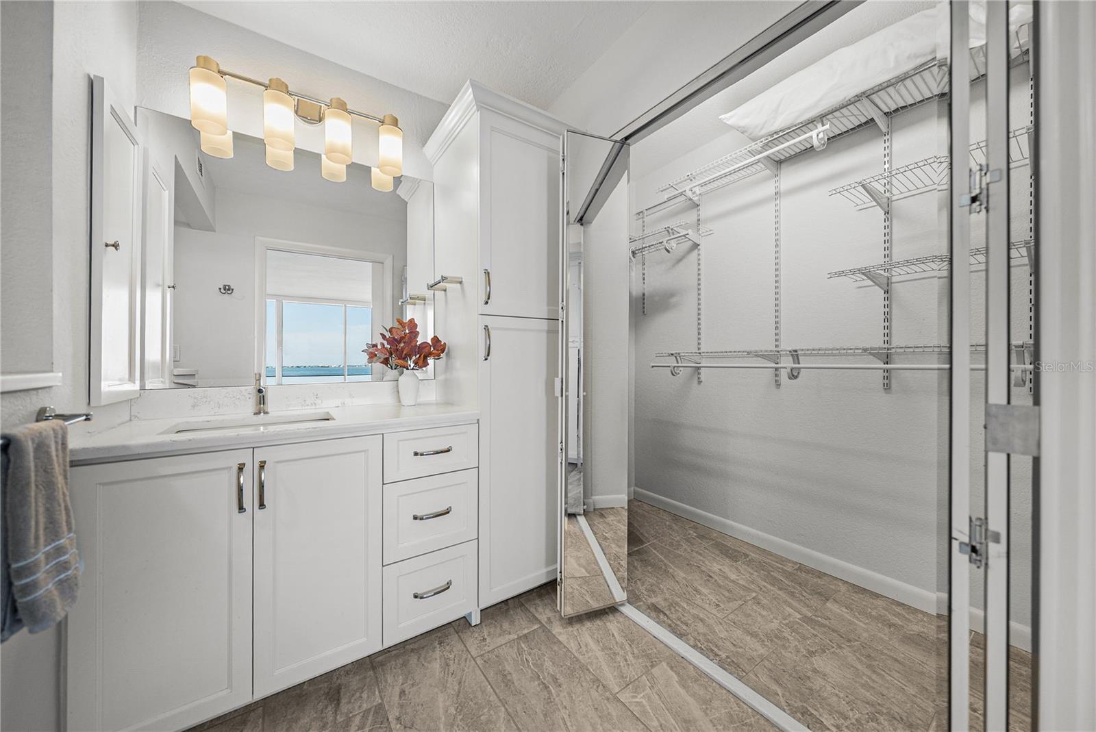 Primary bath and walk-in closet