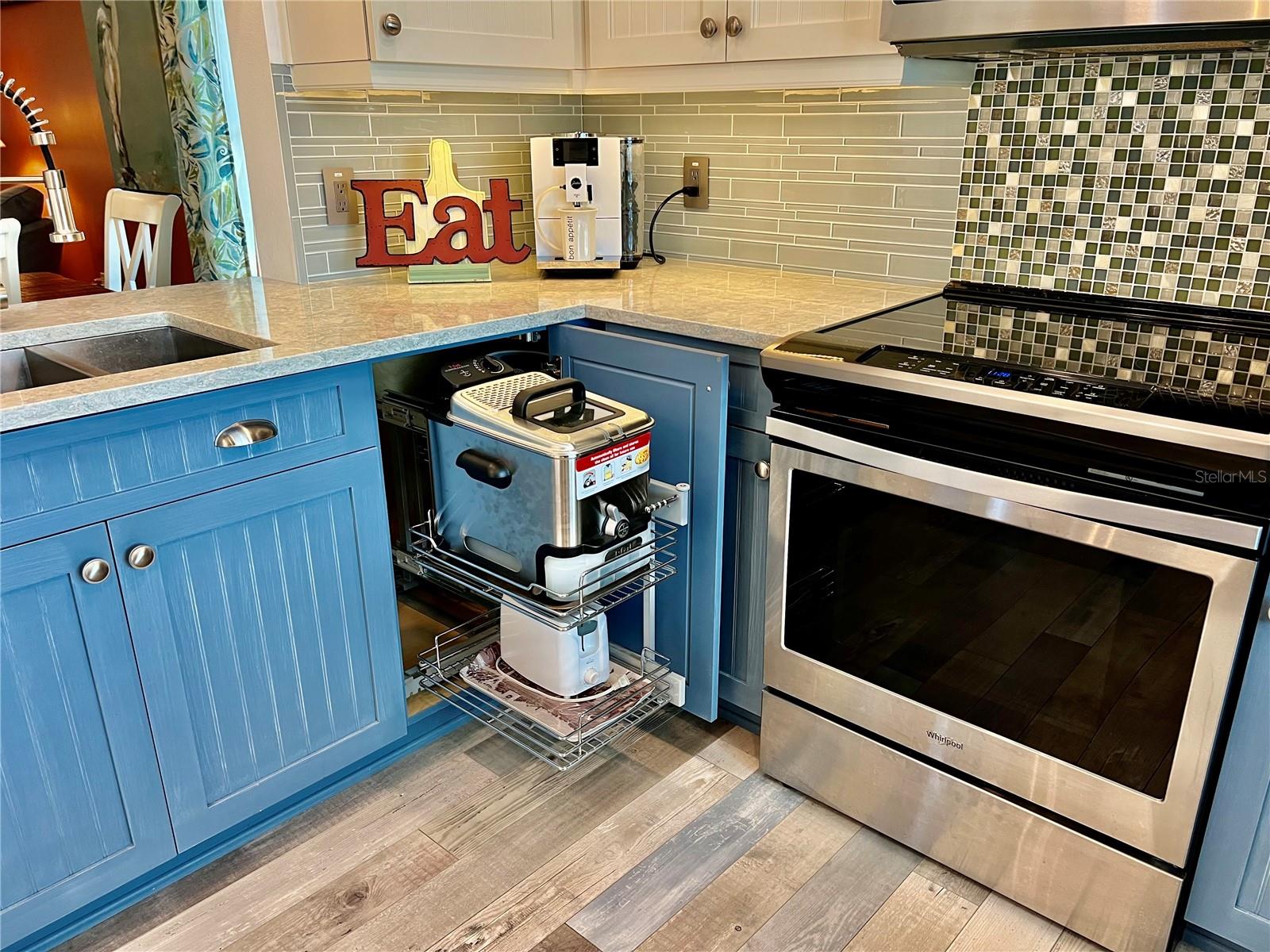 Kitchen with custom cabinet organizera