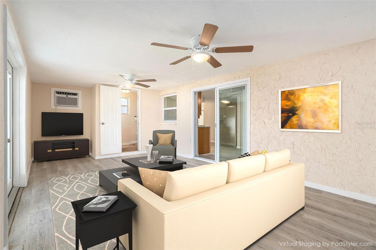 Virtually staged bonus room leading to backyard