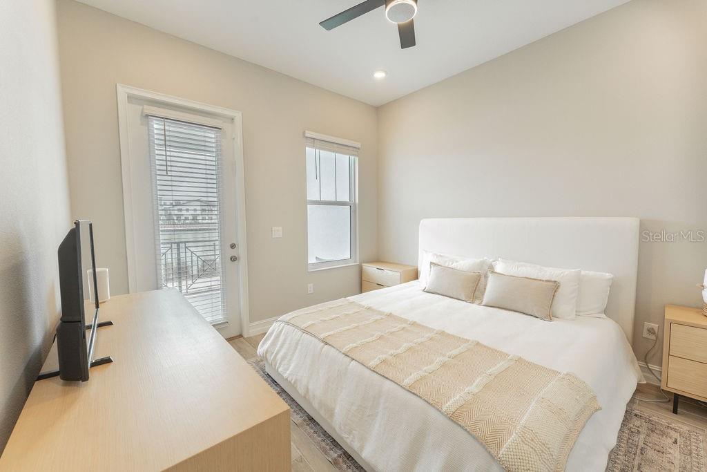 First floor bedroom with private patio access.