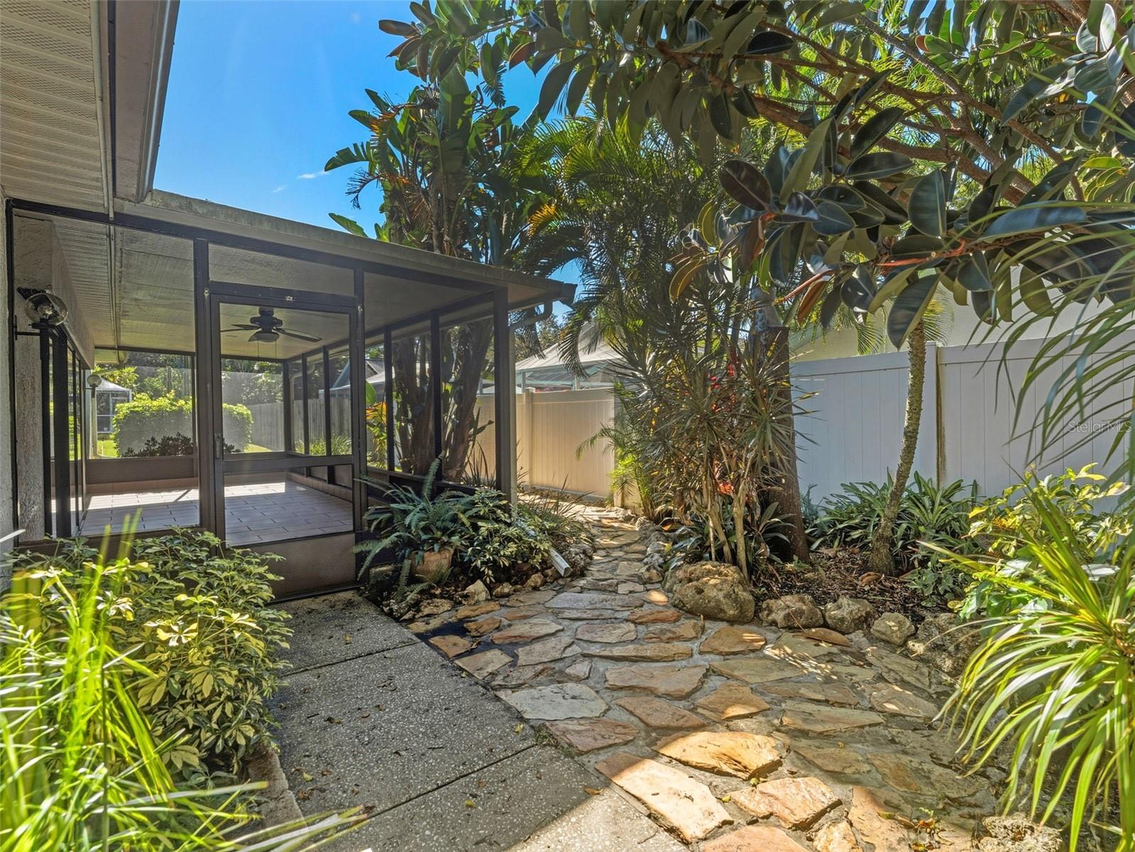 Lanai entrance with stone path behind.