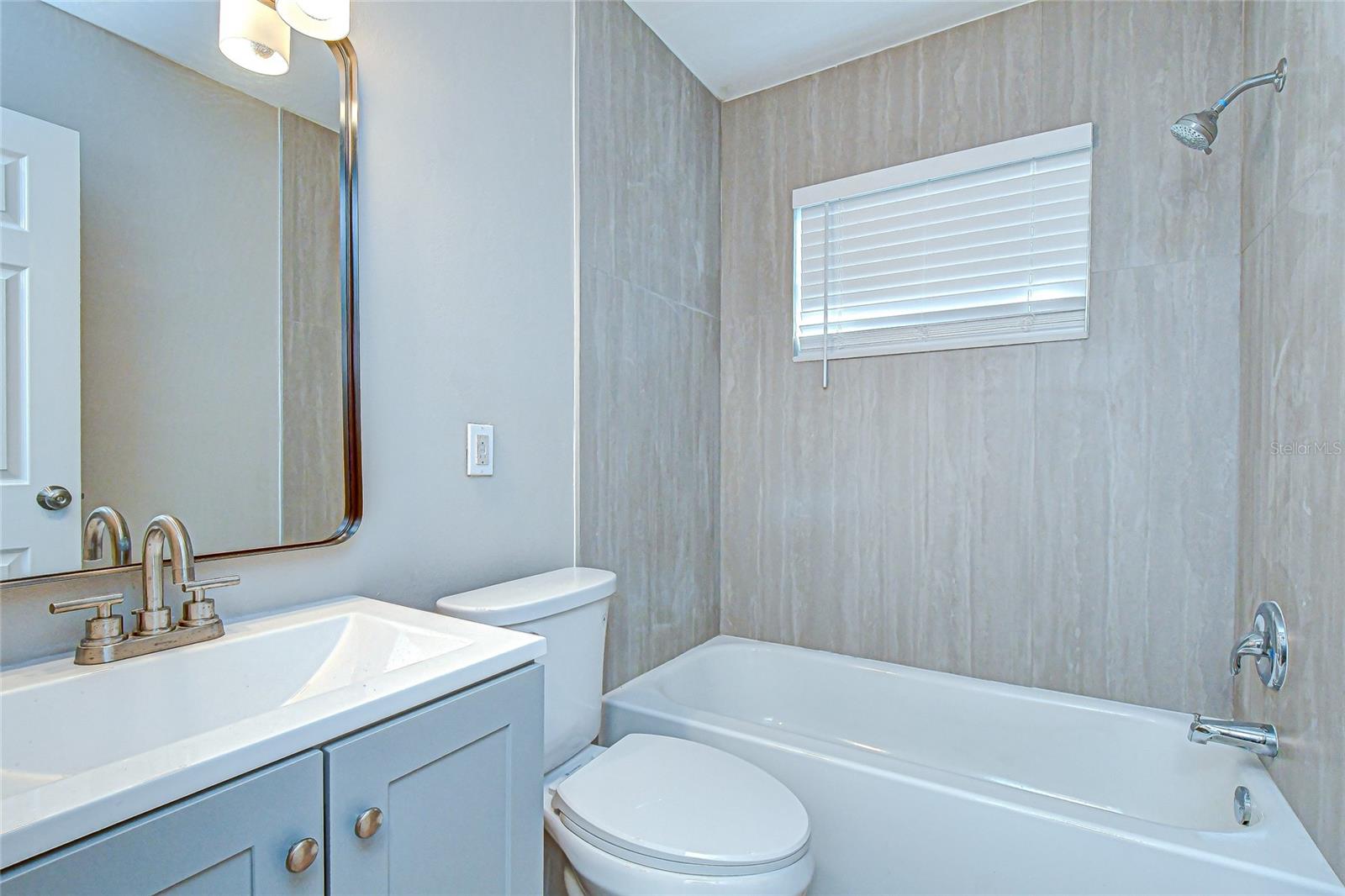 Remodeled Hall Bath with Tub