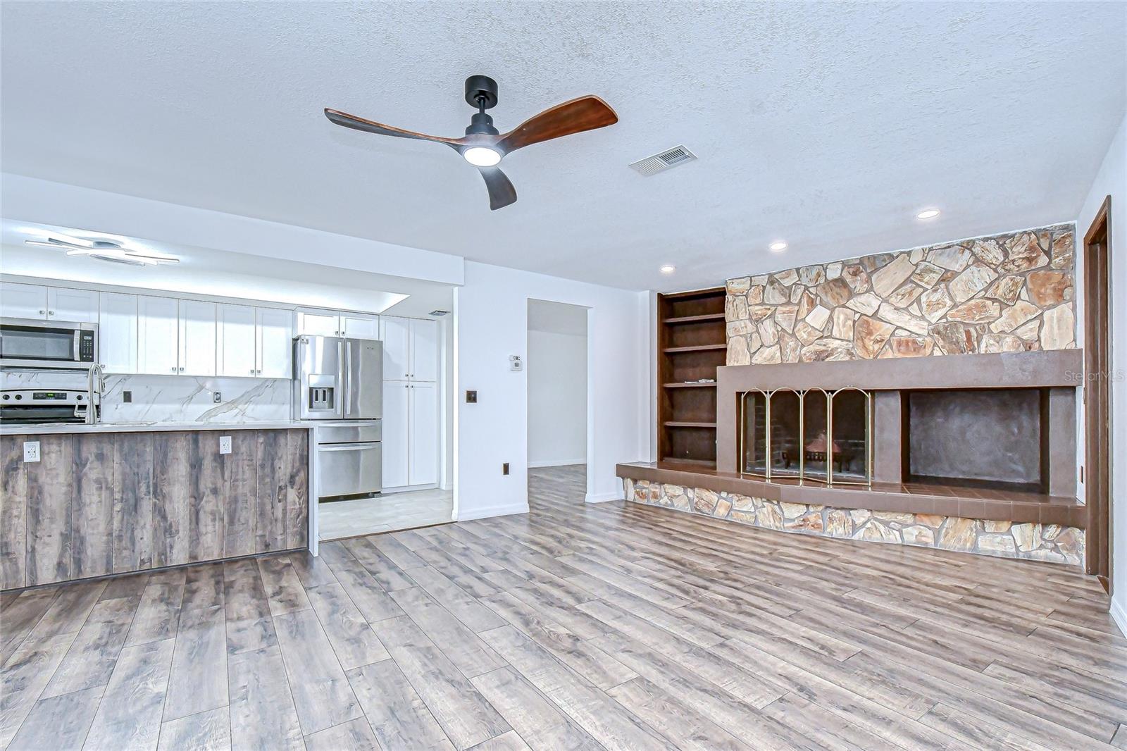 Family room with wood-burning fireplace!