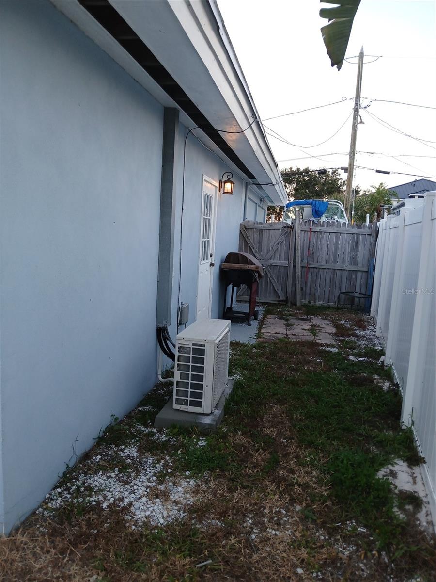Side entrance exit door to the mother in law or 3rd bedroom.