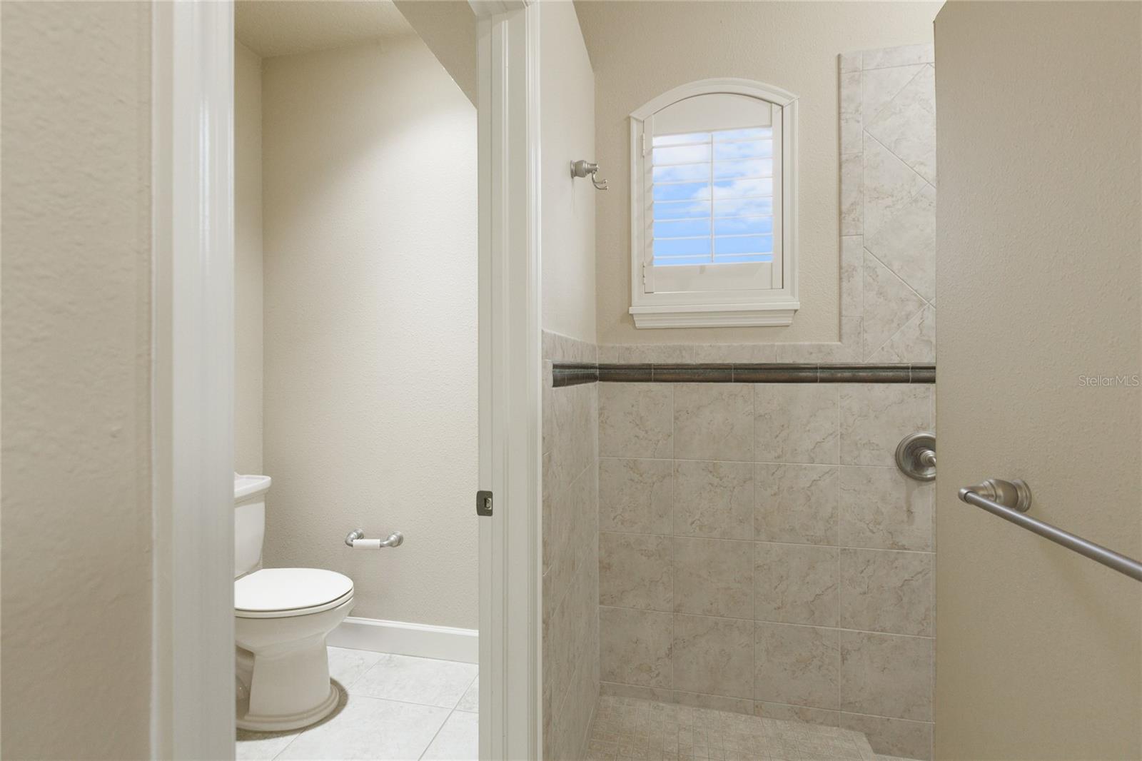 Private water closet in master bathroom
