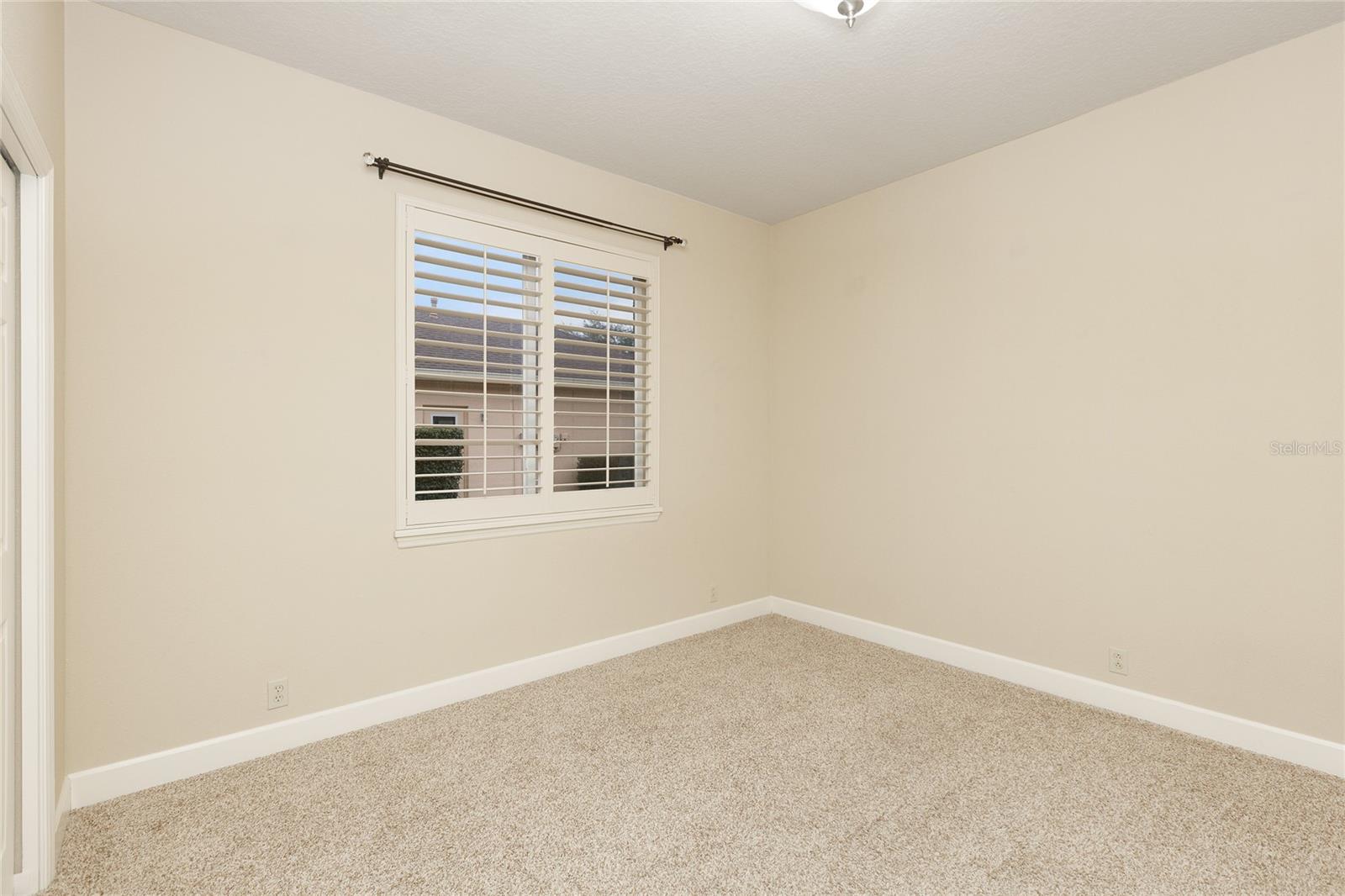 Bedroom 3 with plantation shutters