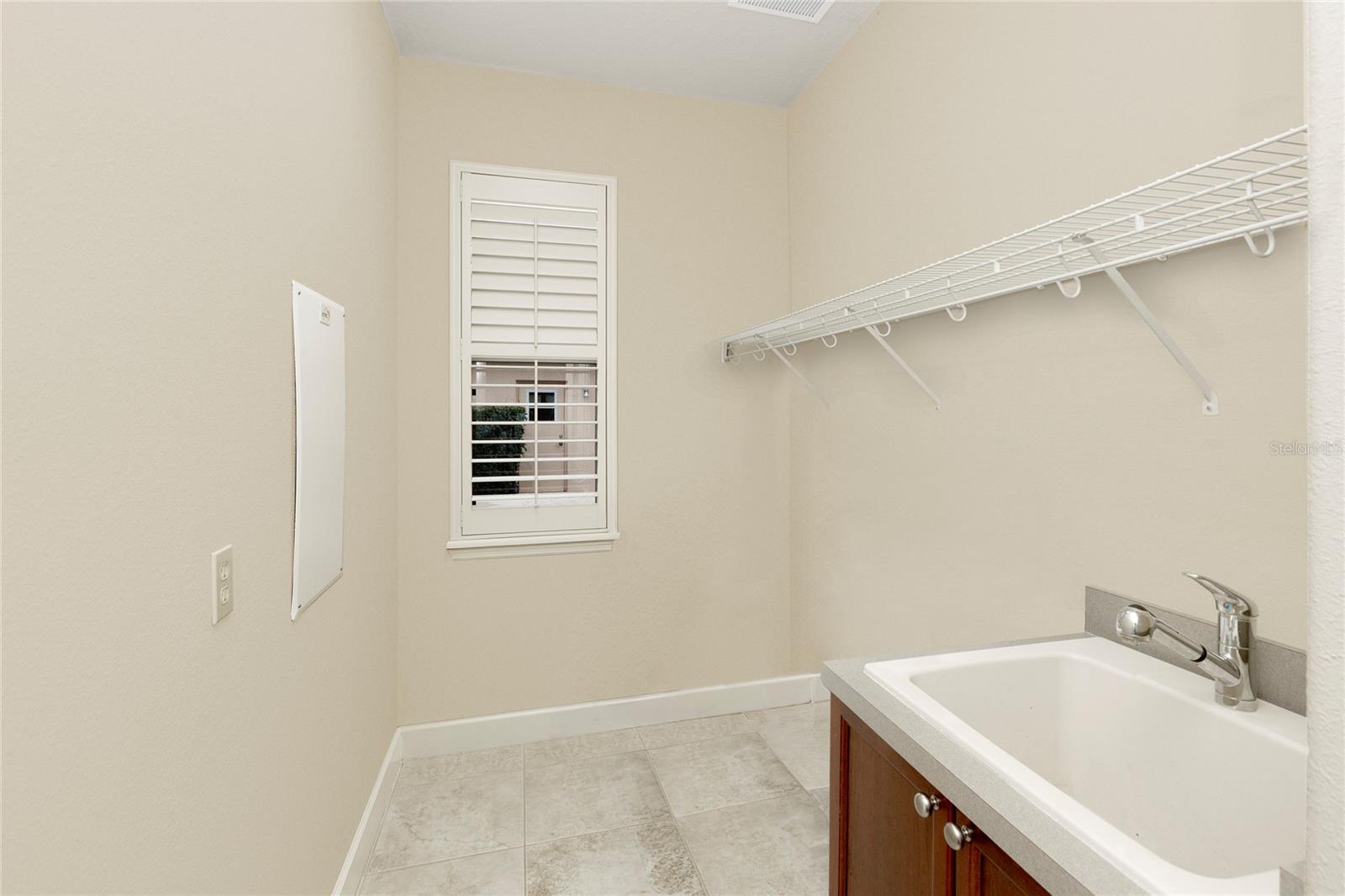 Laundry room with sink