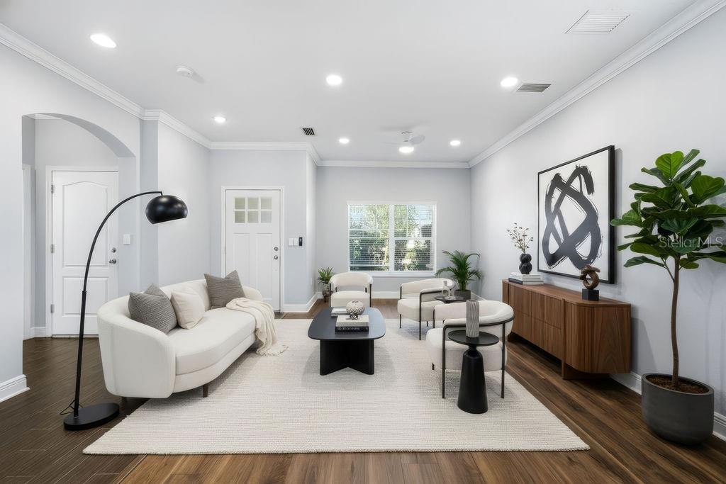 Downstairs living room/den. (Staged)