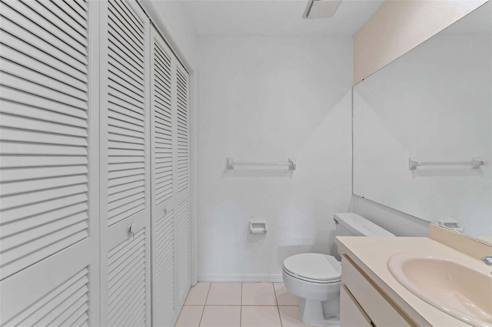 Half bathroom with Laundry Closet