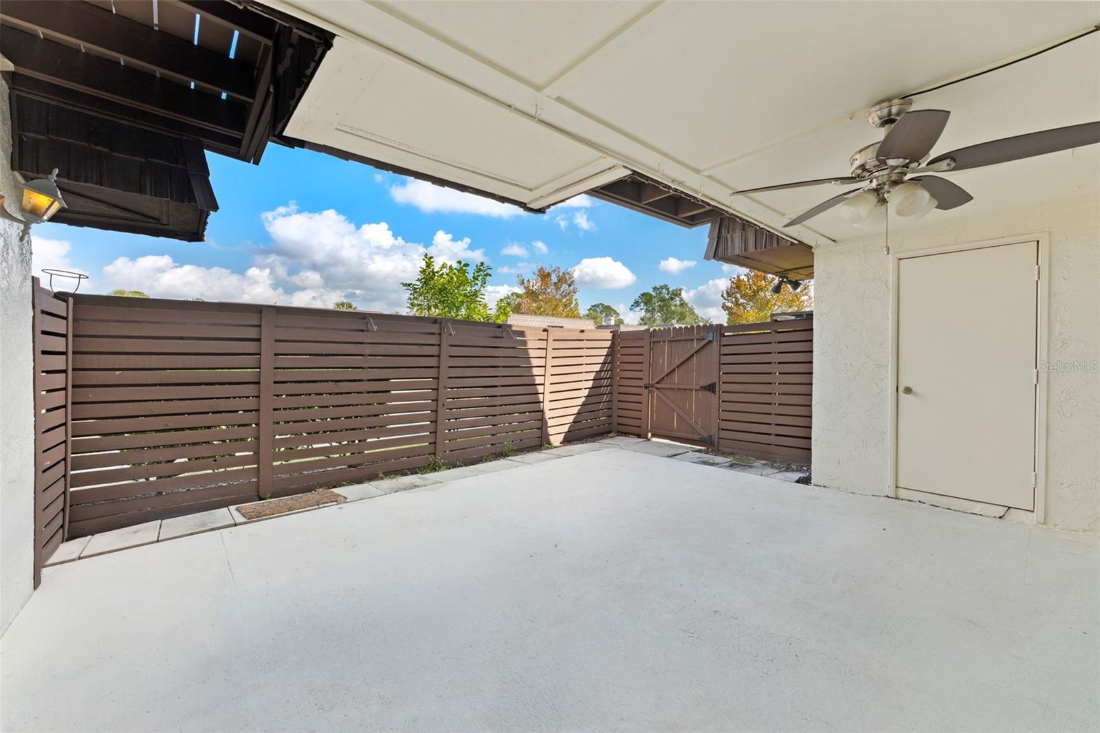 Large enclosed Patio with storage room