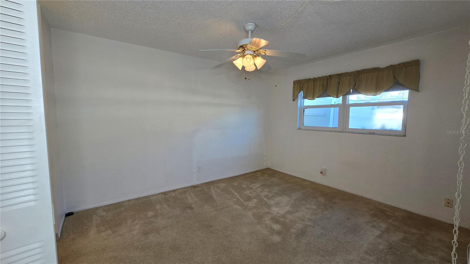 Primary Bedroom with walk in closet.