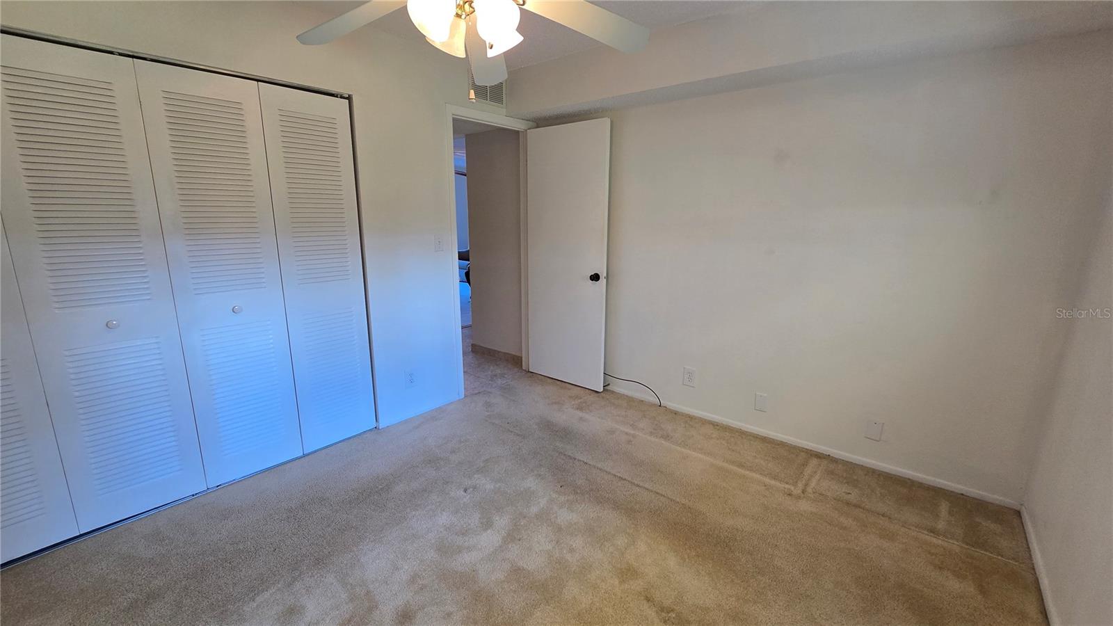 Bedroom 2 with lots of closet space.