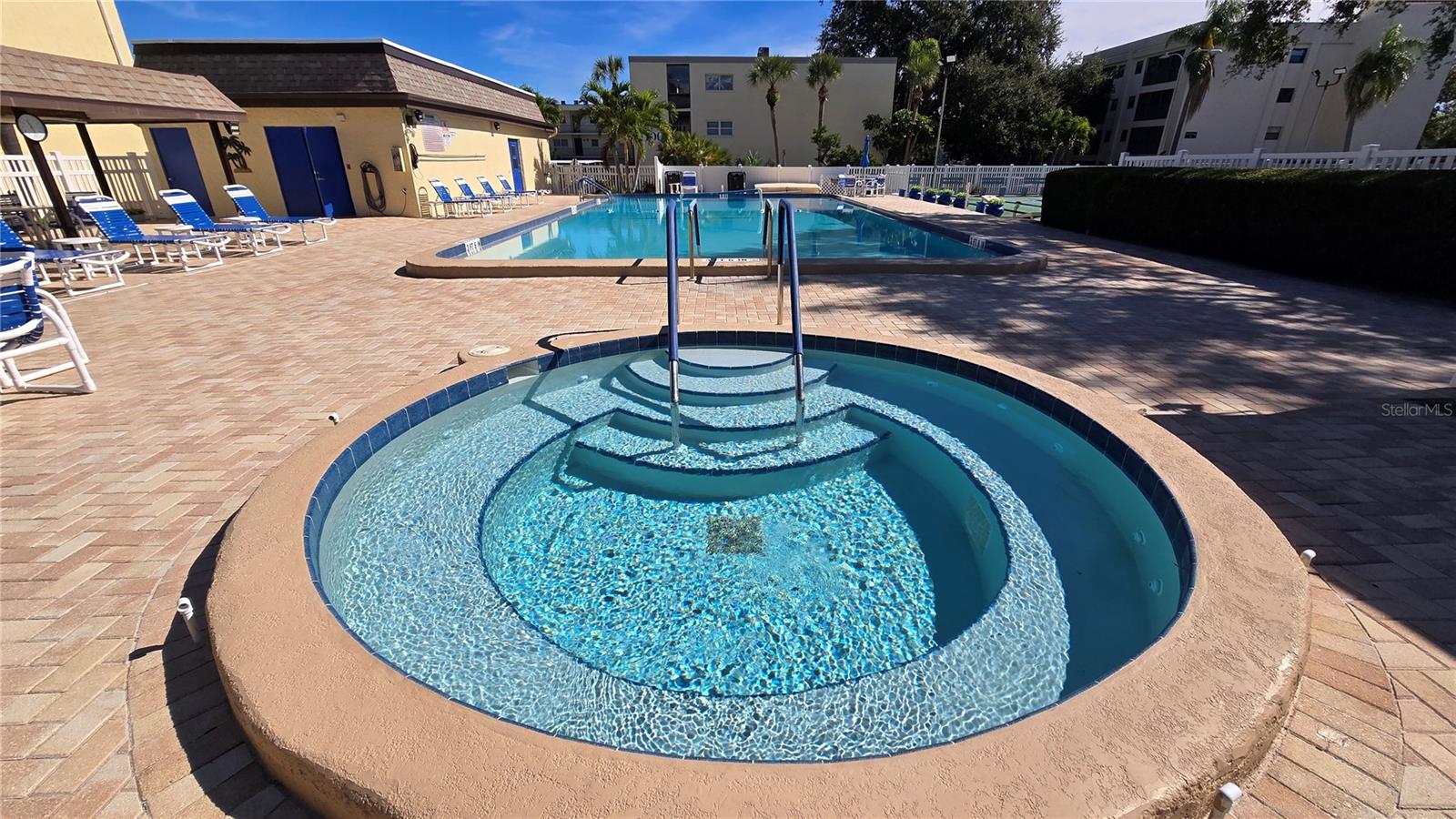 Need some relaxation? Enjoy this inviting Spa in the gated pool area.  Great way to relax or get to know some of your neighbors.