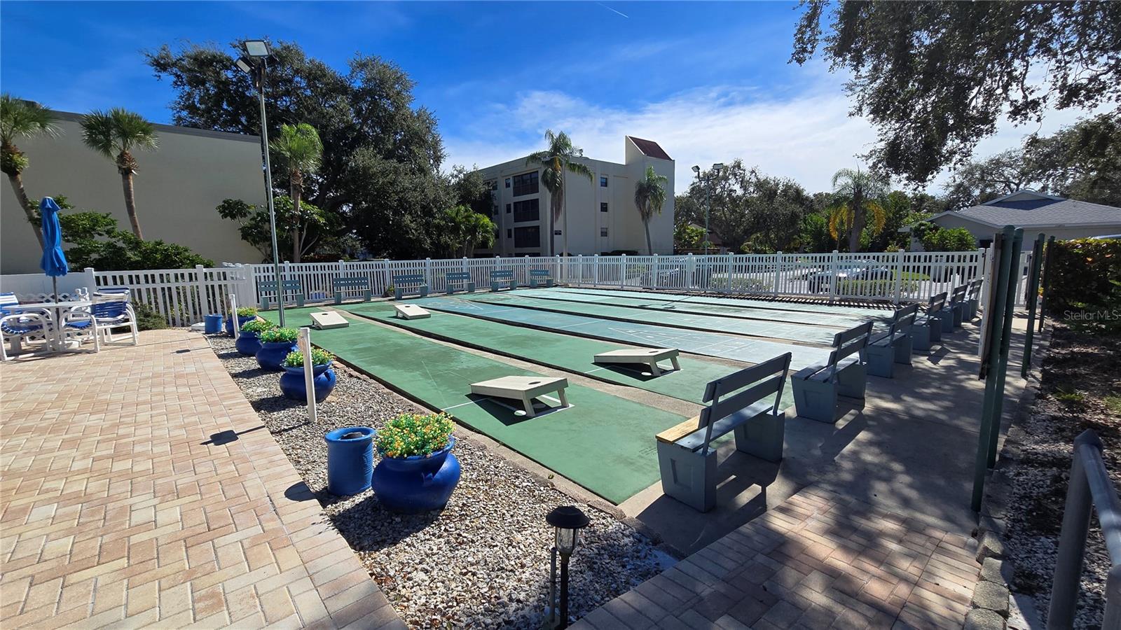 Enjoy playing shuffleboard or Cornhole?  This is part of your HOA and don't have to stroll very far.  Great way to get some sun and exercise in and have some fun.