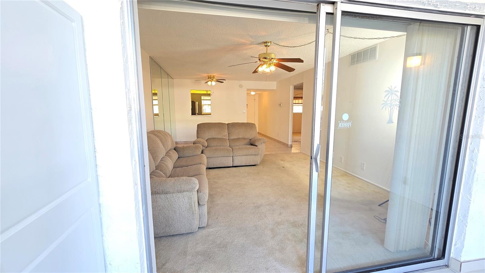 View from the back porch/patio to the inside of the home.