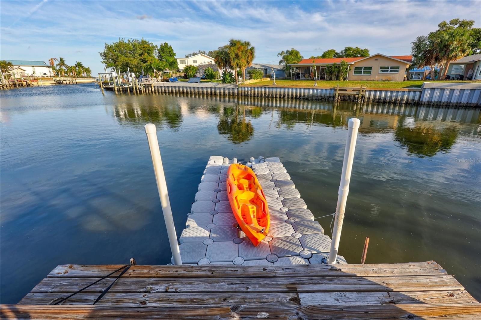 Floating dock can accomodate both a small craft and jet ski