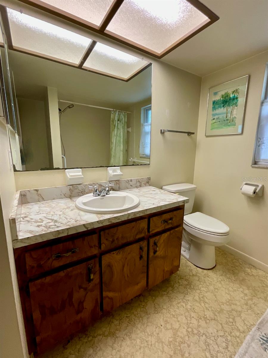 16-Guest bathroom vanity area