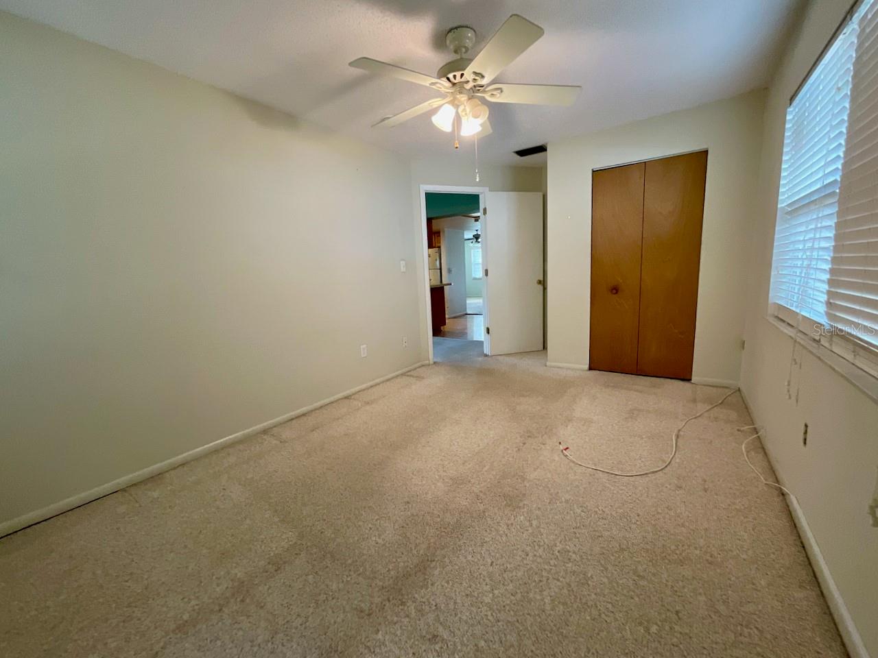 23-Bedroom #3 closet and door to hall