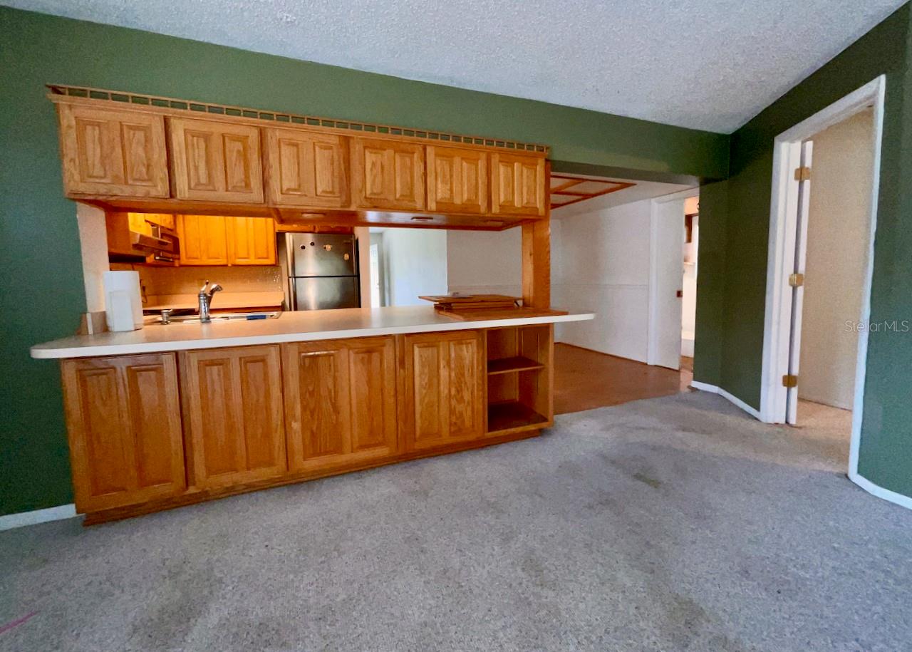 26-Family room counter top bar with cabinets