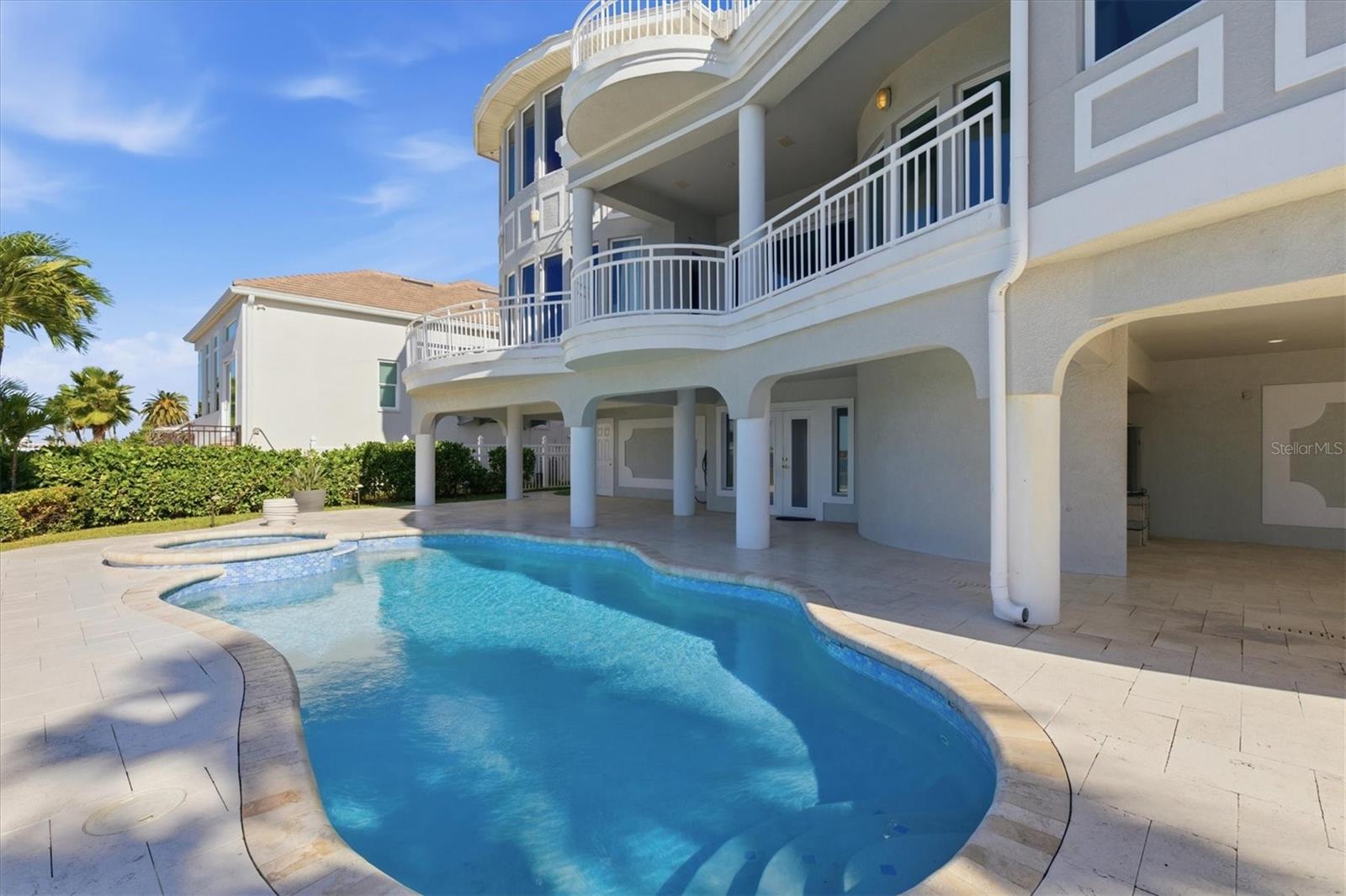 Gorgeous sparkling pool overlooking the Intracoastal