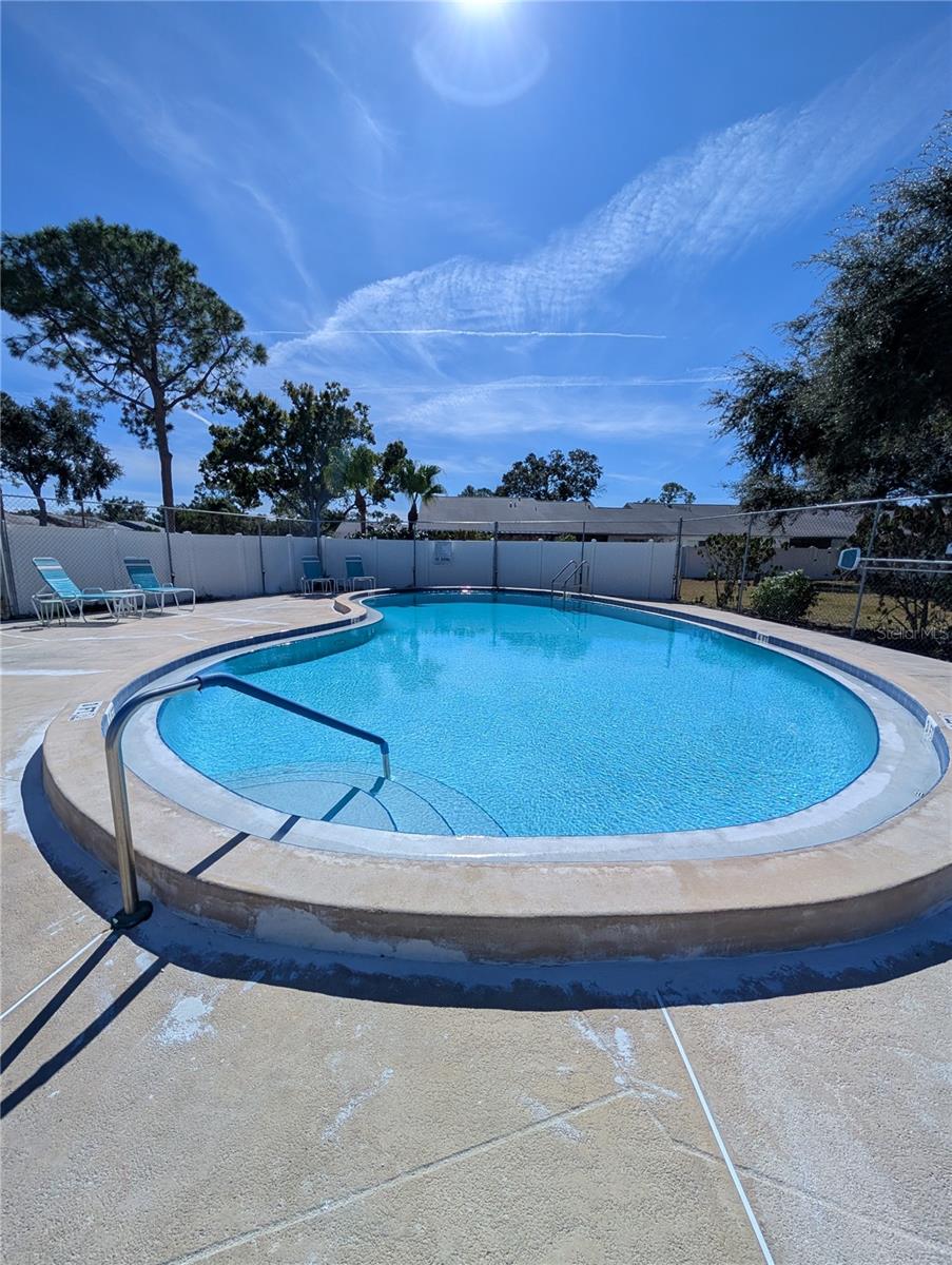 Pool located directly across the street from your unit