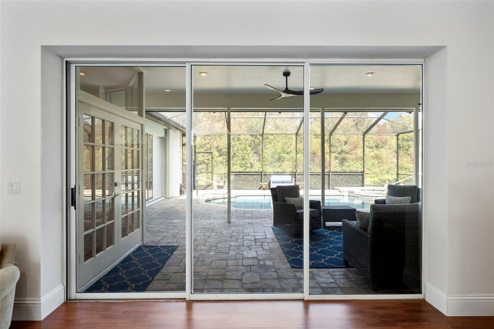 Pocket sliders open to the screened in patio