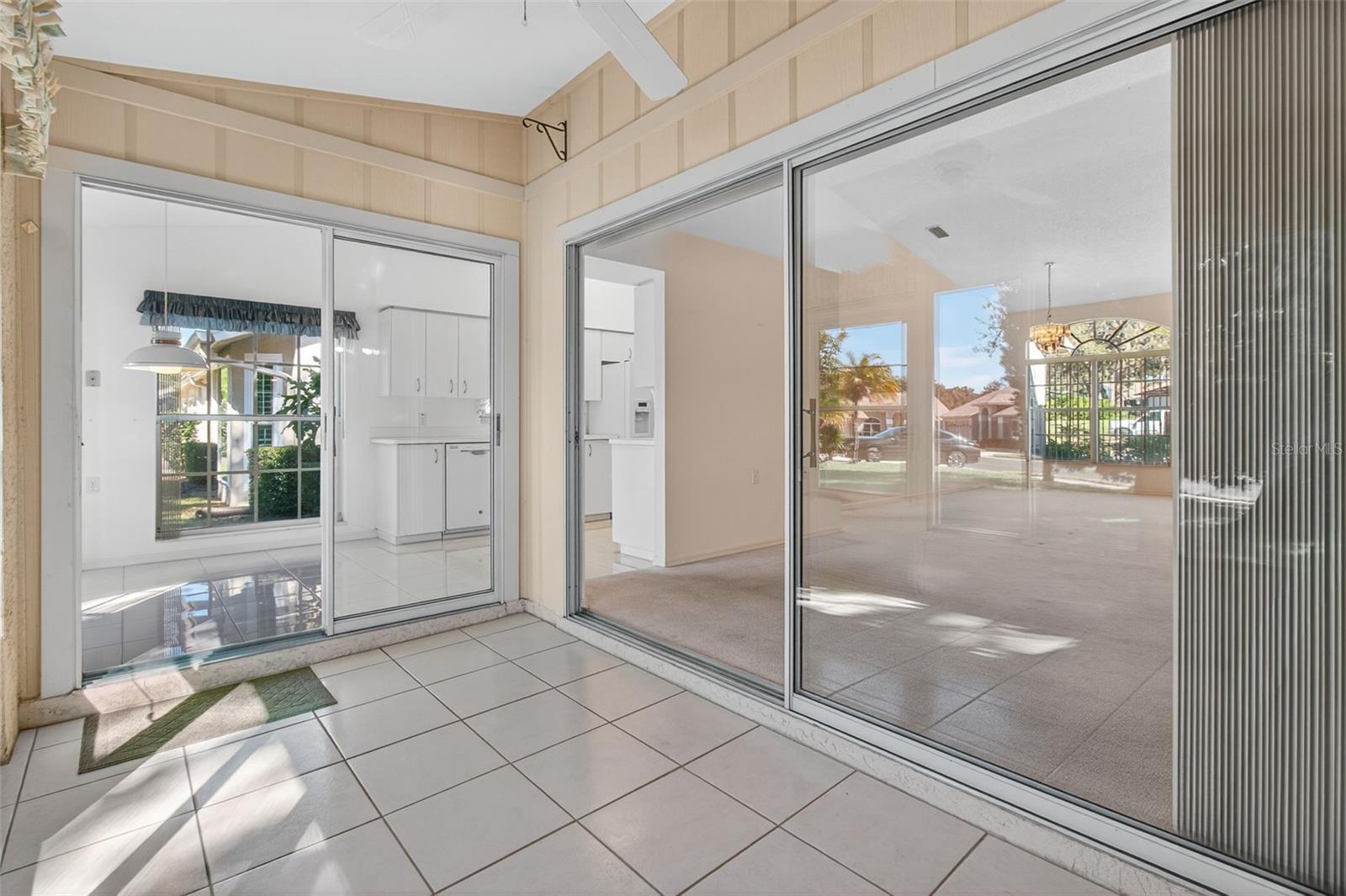 Enclosed Florida room with slider doors.