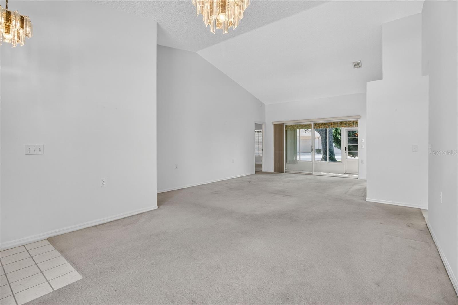 Large open dining room and living room.