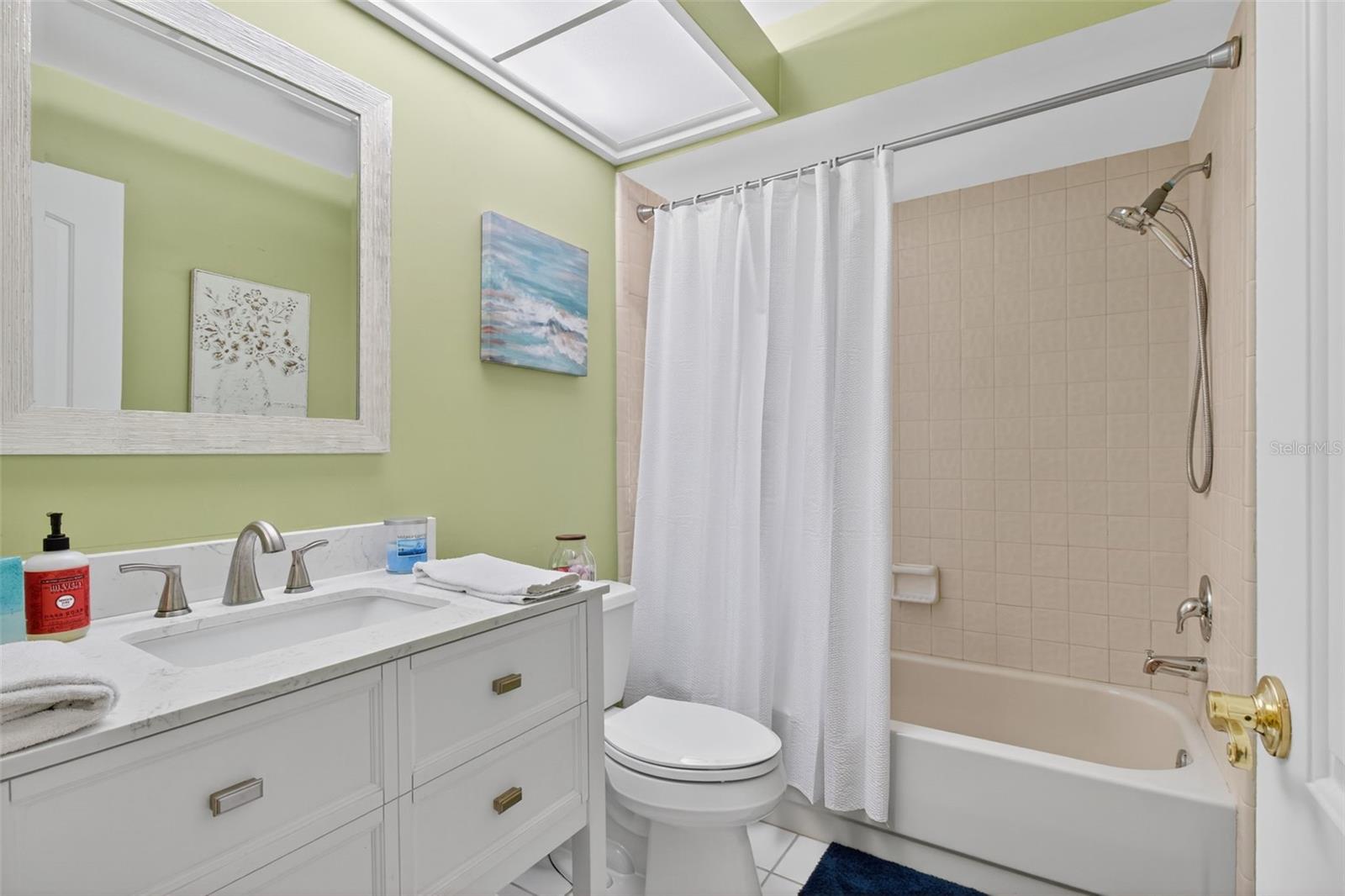 2nd bathroom with bathtub and shower.