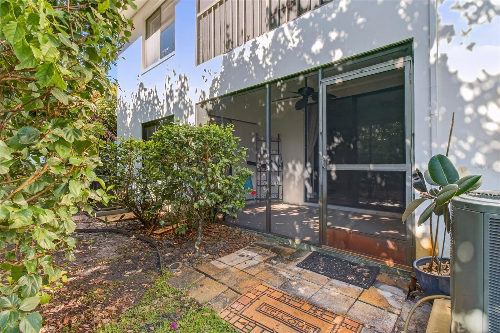 Rear of condo facing the back enclosed patio area.