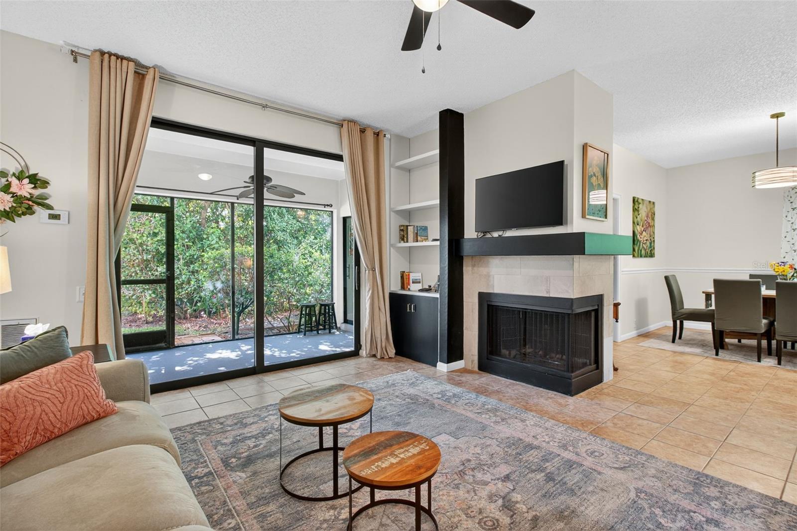Living room featuring a wood burning fireplace!