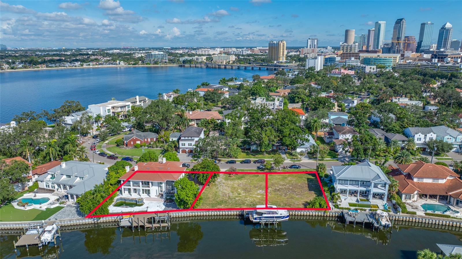 Adjacent vacant homesites also available. Package sale of all 3 properties includes luxury power cat boat