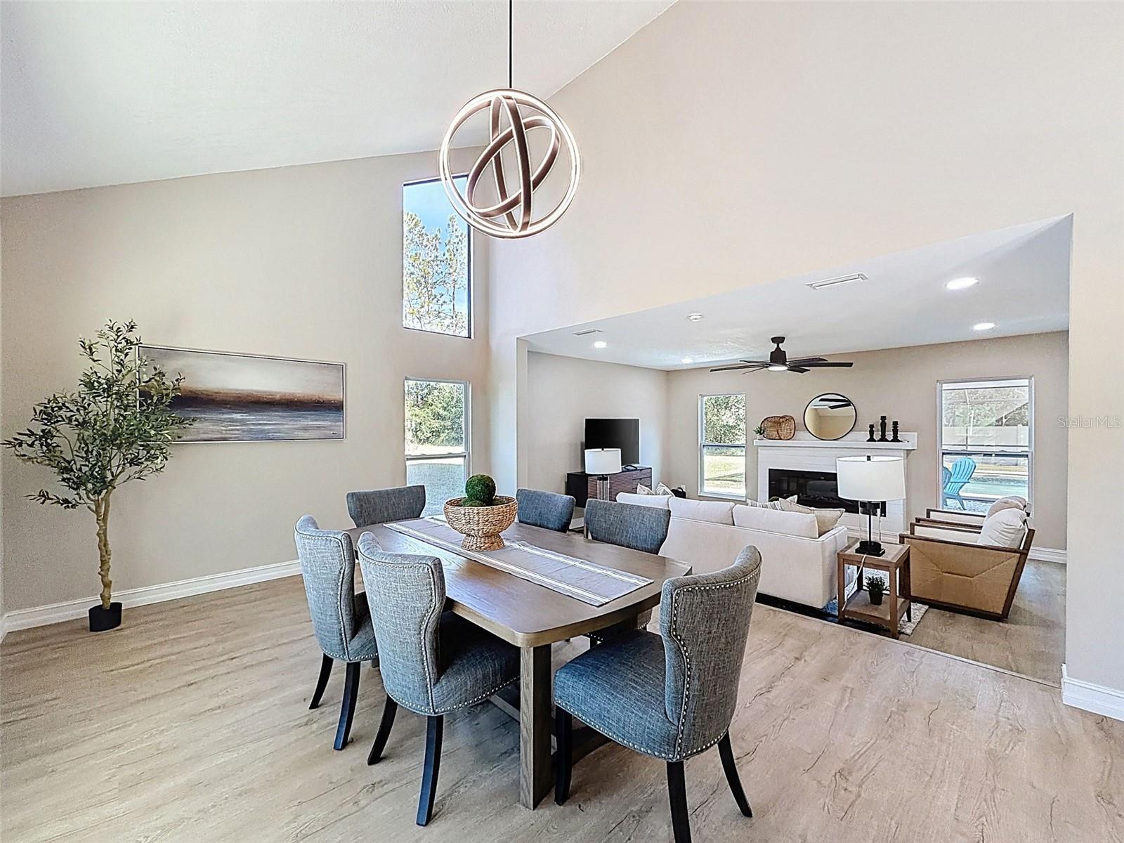 Staged as a huge dining room, but equally fitting as an extended living room.